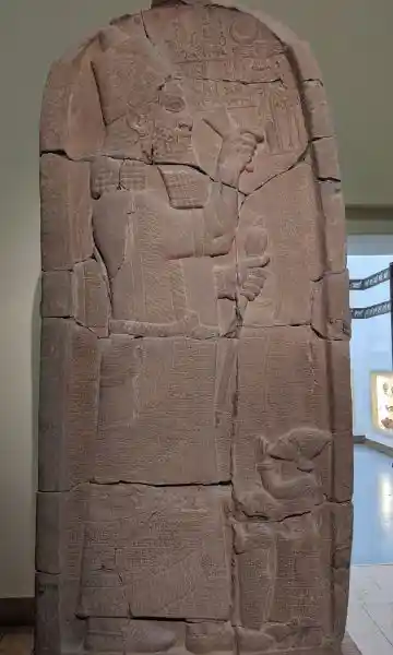 Victory stele of Esarhaddon, winged disc, sun, crescent